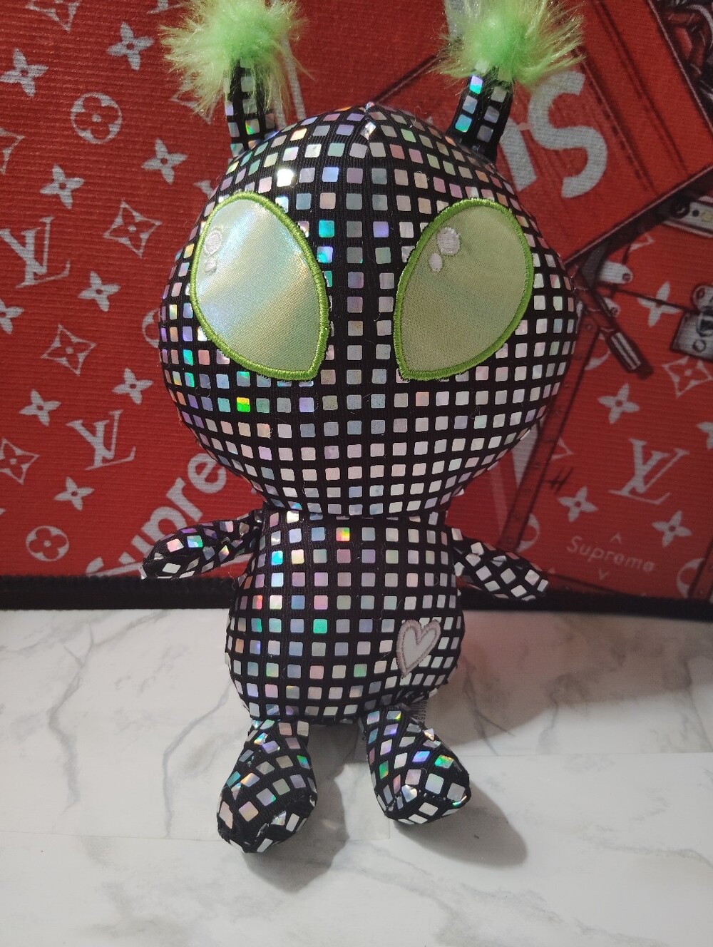 Holographic Checkered Alien Plush with Lime Eyes and Tufts